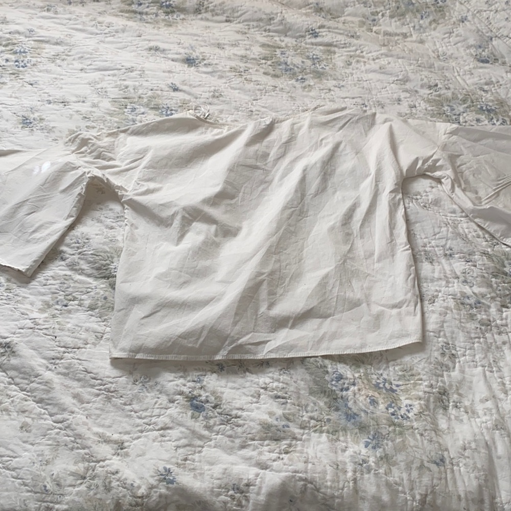 White lord and Taylor top with bell sleeves